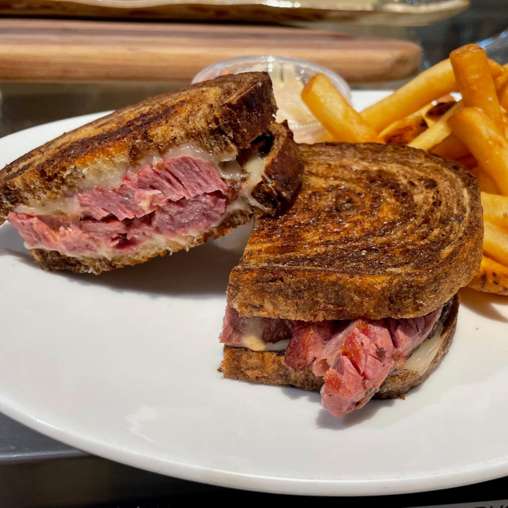 Corned Beef SDWCH on Marble Rye, Marinated Slaw + 1 Side